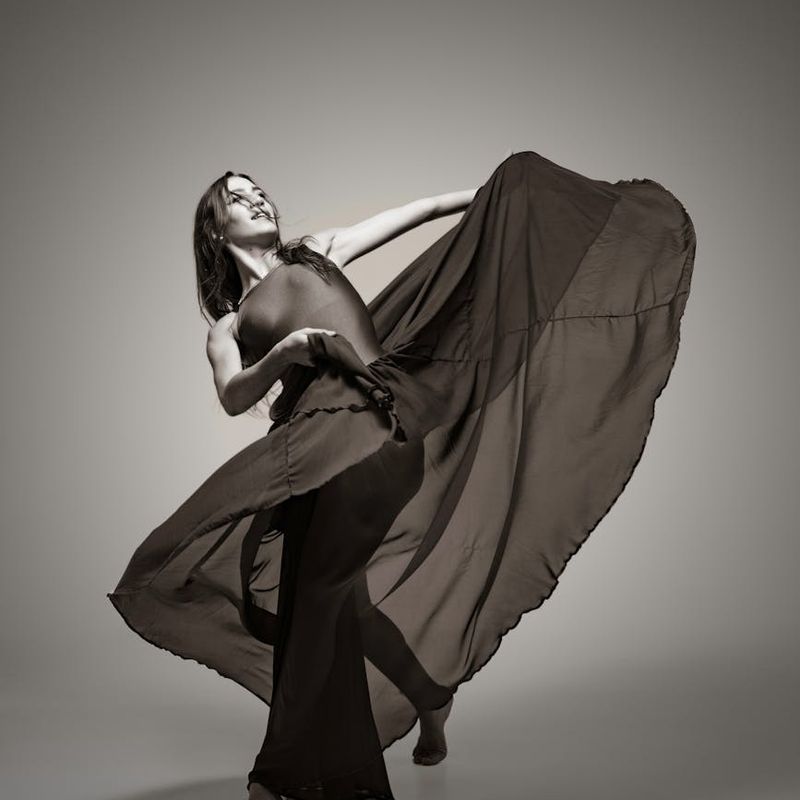 A dynamic shot capturing the flow of movement between two yoga poses.